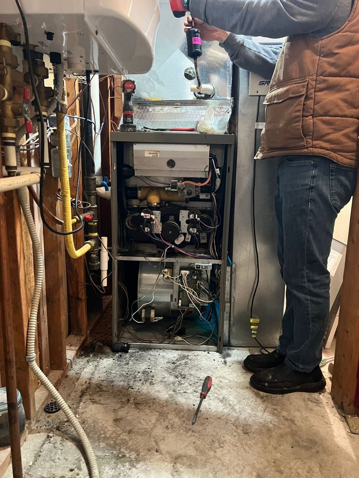 Old gas furnace being removed