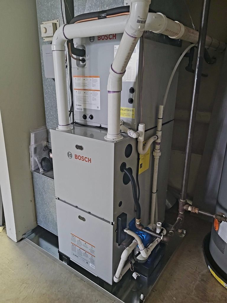 Bosch high-efficiency furnace with PVC venting and condensate drain connections