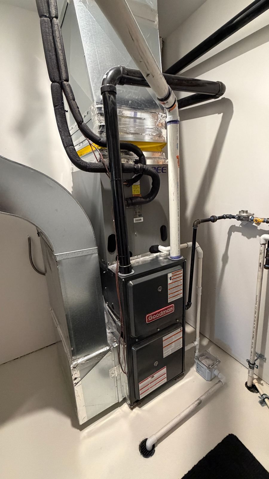 Goodman high-efficiency furnace installed in dedicated closet