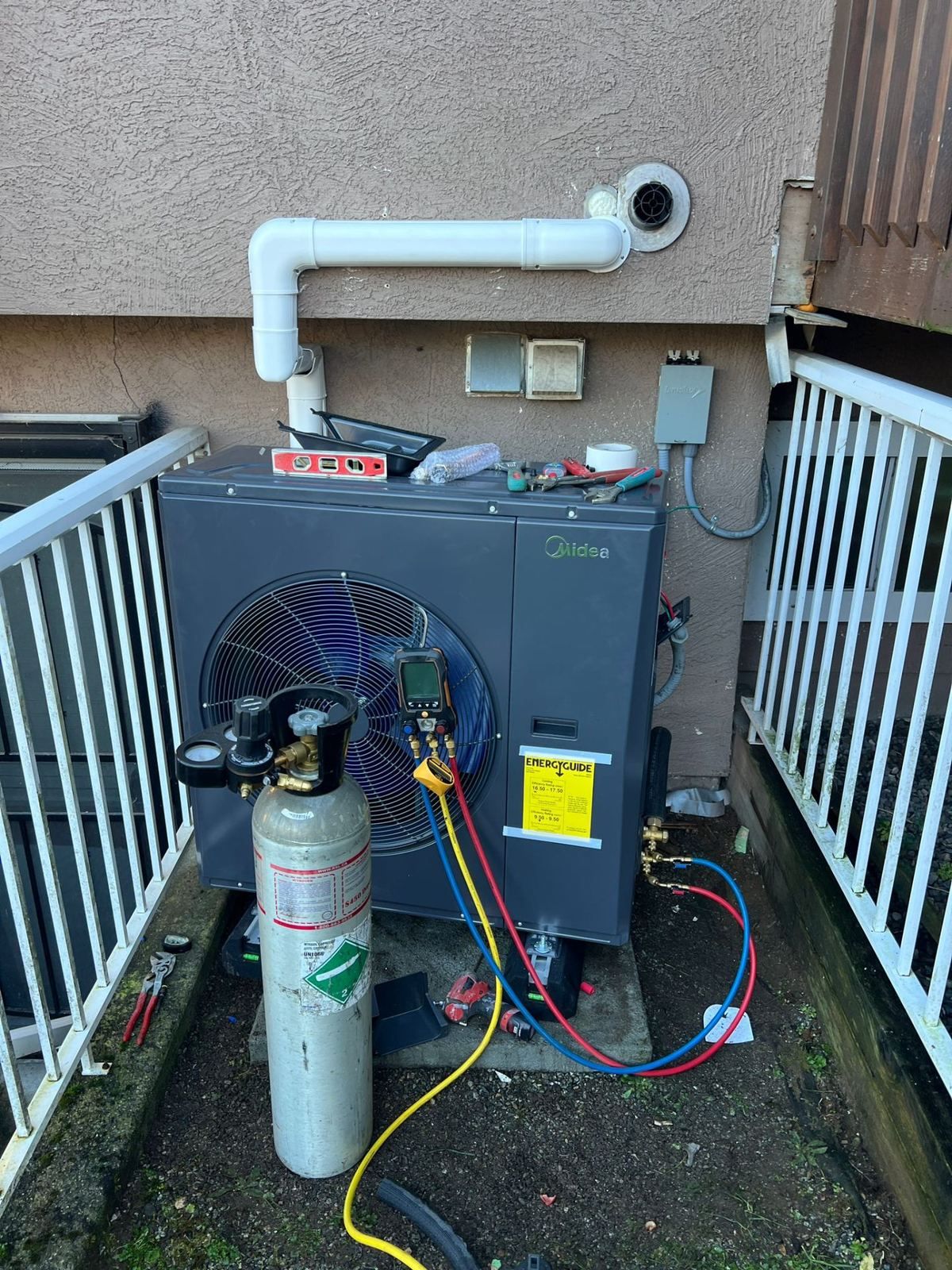 Midea outdoor condenser during refrigerant commissioning