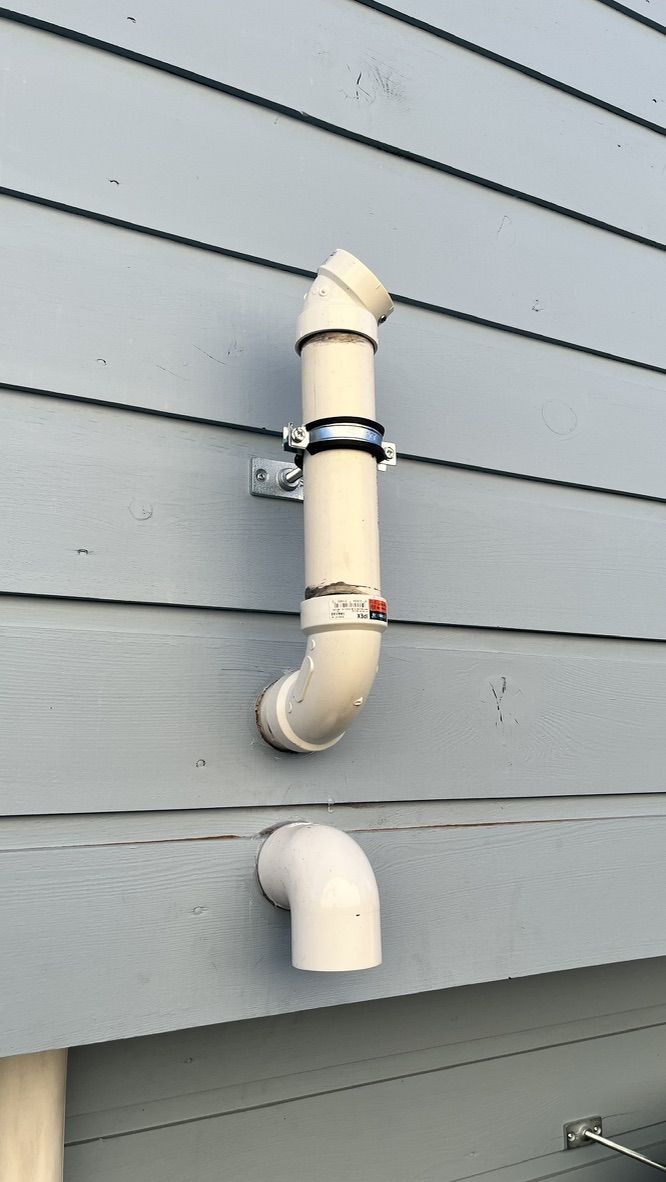 PVC exhaust and intake venting on exterior wall for high-efficiency furnace
